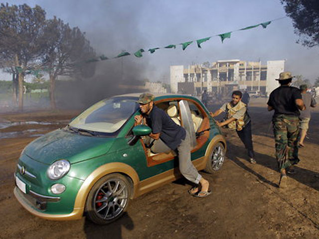 Libyan rebels liberate Gaddafi's custom Fiat 500 image via Jalopnik